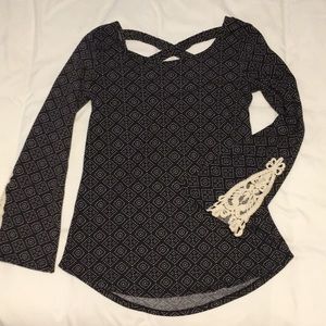 Maurice’s open back bell-sleeve top